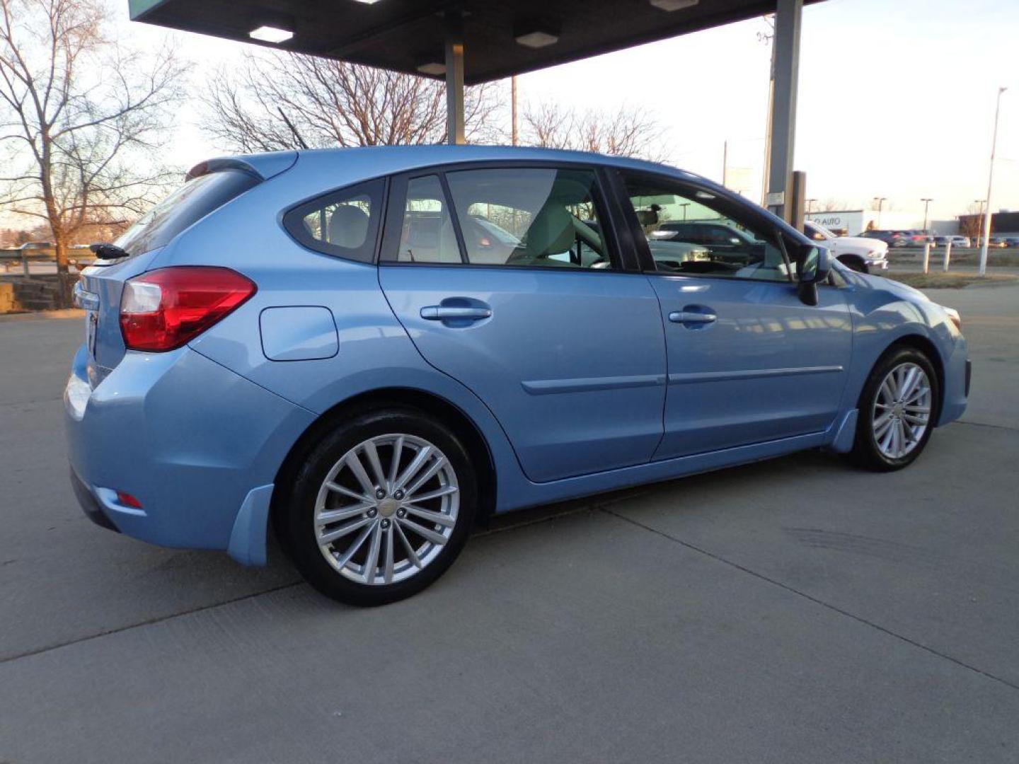 2012 BLUE SUBARU IMPREZA PREMIUM (JF1GPAD63CH) with an 2.0L engine, Continuously Variable transmission, located at 6610 L St., Omaha, NE, 68117, (402) 731-7800, 41.212872, -96.014702 - 2-OWNER, CLEAN CARFAX, LOW MILEAGE, SUNROOF, HEATED TIRES AND NEWER TIRES! *****We have found that most customers do the majority of their shopping online before visiting a dealership. For this reason we feel it necessary to have a competitive price on our used vehicles right up front. We sp - Photo#3