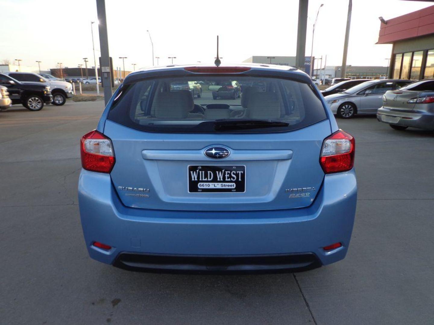 2012 BLUE SUBARU IMPREZA PREMIUM (JF1GPAD63CH) with an 2.0L engine, Continuously Variable transmission, located at 6610 L St., Omaha, NE, 68117, (402) 731-7800, 41.212872, -96.014702 - 2-OWNER, CLEAN CARFAX, LOW MILEAGE, SUNROOF, HEATED TIRES AND NEWER TIRES! *****We have found that most customers do the majority of their shopping online before visiting a dealership. For this reason we feel it necessary to have a competitive price on our used vehicles right up front. We sp - Photo#4