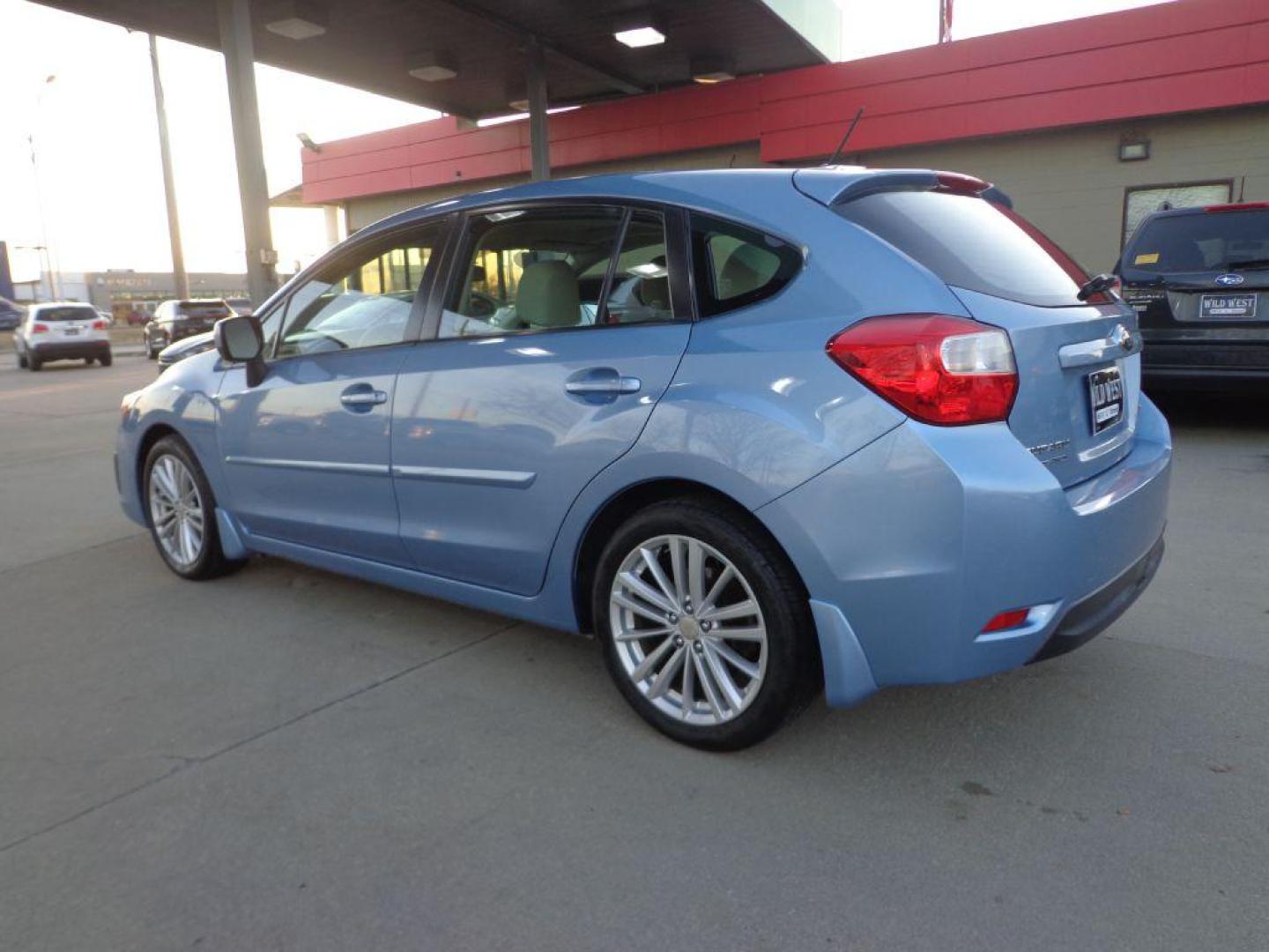 2012 BLUE SUBARU IMPREZA PREMIUM (JF1GPAD63CH) with an 2.0L engine, Continuously Variable transmission, located at 6610 L St., Omaha, NE, 68117, (402) 731-7800, 41.212872, -96.014702 - 2-OWNER, CLEAN CARFAX, LOW MILEAGE, SUNROOF, HEATED TIRES AND NEWER TIRES! *****We have found that most customers do the majority of their shopping online before visiting a dealership. For this reason we feel it necessary to have a competitive price on our used vehicles right up front. We sp - Photo#5