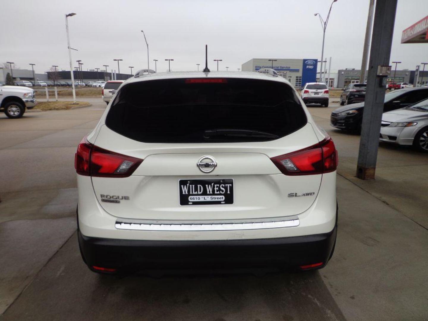 2018 WHITE NISSAN ROGUE SPORT SL (JN1BJ1CRXJW) with an 2.0L engine, Continuously Variable transmission, located at 6610 L St., Omaha, NE, 68117, (402) 731-7800, 41.212872, -96.014702 - 1-OWNER, CLEAN CARFAX, LOADED WITH PREMIUM PACKAGE! *****We have found that most customers do the majority of their shopping online before visiting a dealership. For this reason we feel it necessary to have a competitive price on our used vehicles right up front. We spend time researching the - Photo#4