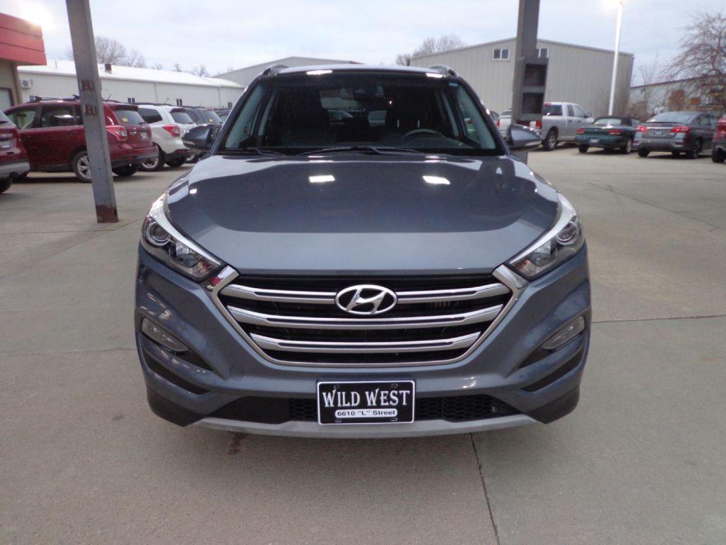 2017 GRAY HYUNDAI TUCSON LIMITED (KM8J3CA24HU) with an 1.6L engine, Automatic transmission, located at 6610 L St., Omaha, NE, 68117, (402) 731-7800, 41.212872, -96.014702 - Photo#1