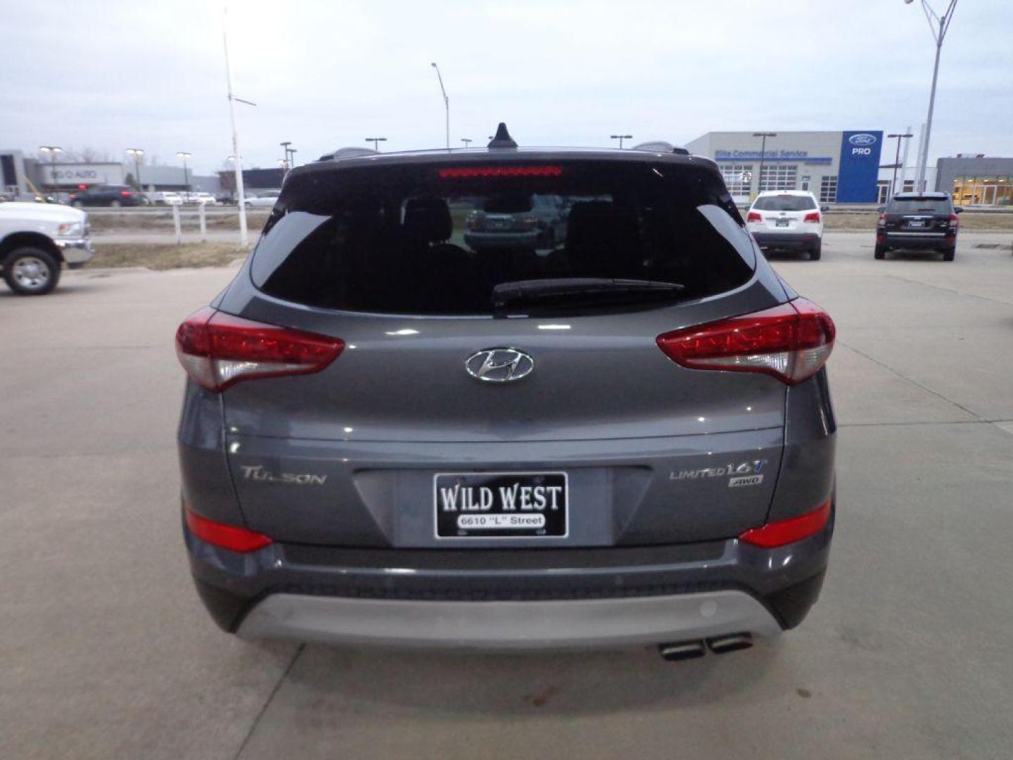 2017 GRAY HYUNDAI TUCSON LIMITED (KM8J3CA24HU) with an 1.6L engine, Automatic transmission, located at 6610 L St., Omaha, NE, 68117, (402) 731-7800, 41.212872, -96.014702 - Photo#4