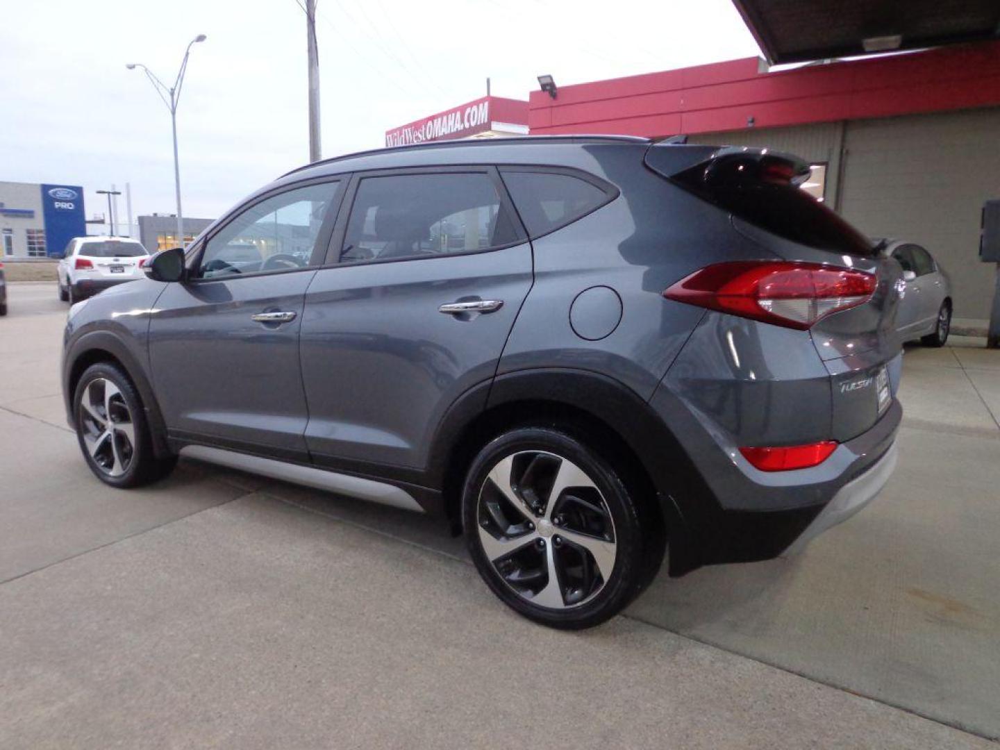 2017 GRAY HYUNDAI TUCSON LIMITED (KM8J3CA24HU) with an 1.6L engine, Automatic transmission, located at 6610 L St., Omaha, NE, 68117, (402) 731-7800, 41.212872, -96.014702 - Photo#5