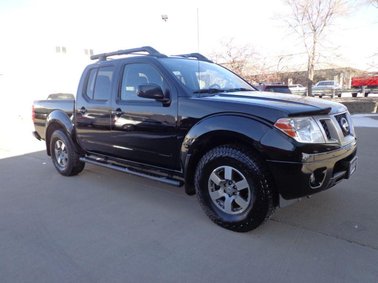 2013 BLACK NISSAN FRONTIER PRO-4X (1N6AD0EV6DN) with an 4.0L engine, Automatic transmission, located at 6610 L St., Omaha, NE, 68117, (402) 731-7800, 41.212872, -96.014702 - SHARP PRO-4X WITH LOW MILEAGE, HEATED LEATHER, NAV, BACKUP CAM, SUNROOF AND NEWER TIRES! *****We have found that most customers do the majority of their shopping online before visiting a dealership. For this reason we feel it necessary to have a competitive price on our used vehicles right up - Photo#2