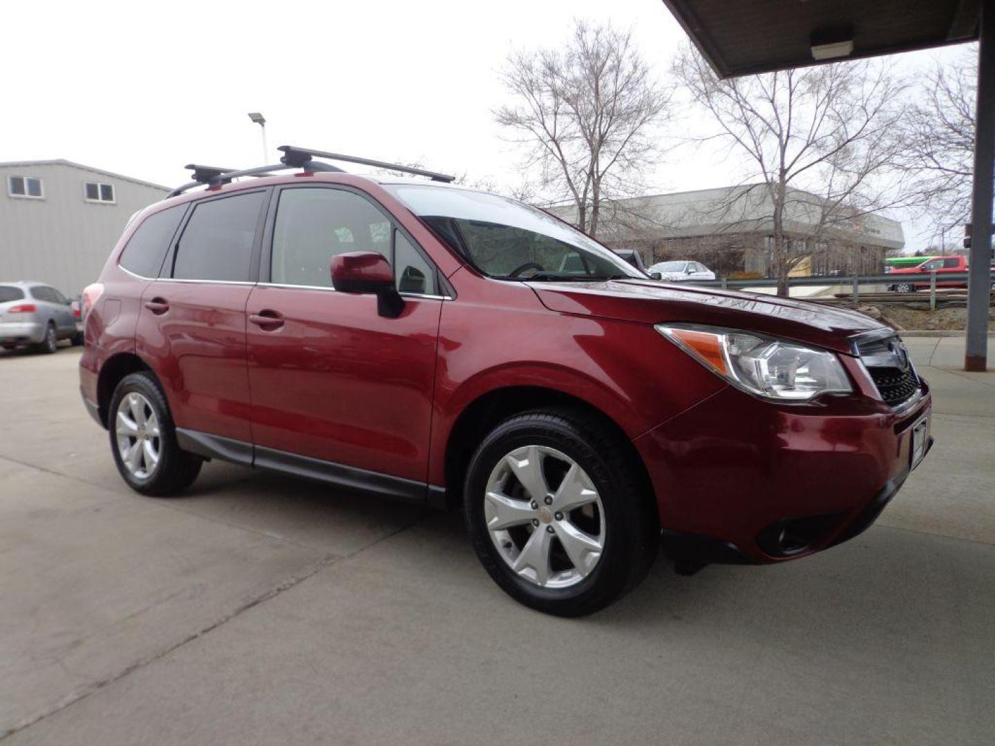 2014 RED SUBARU FORESTER 2.5I LIMITED (JF2SJAHC1EH) with an 2.5L engine, Continuously Variable transmission, located at 6610 L St., Omaha, NE, 68117, (402) 731-7800, 41.212872, -96.014702 - SHARP LIMITED MODEL WITH SUNROOF, BACKUP CAM, HEATED LEATHER AND NEWER TIRES! *****We have found that most customers do the majority of their shopping online before visiting a dealership. For this reason we feel it necessary to have a competitive price on our used vehicles right up front. W - Photo#2