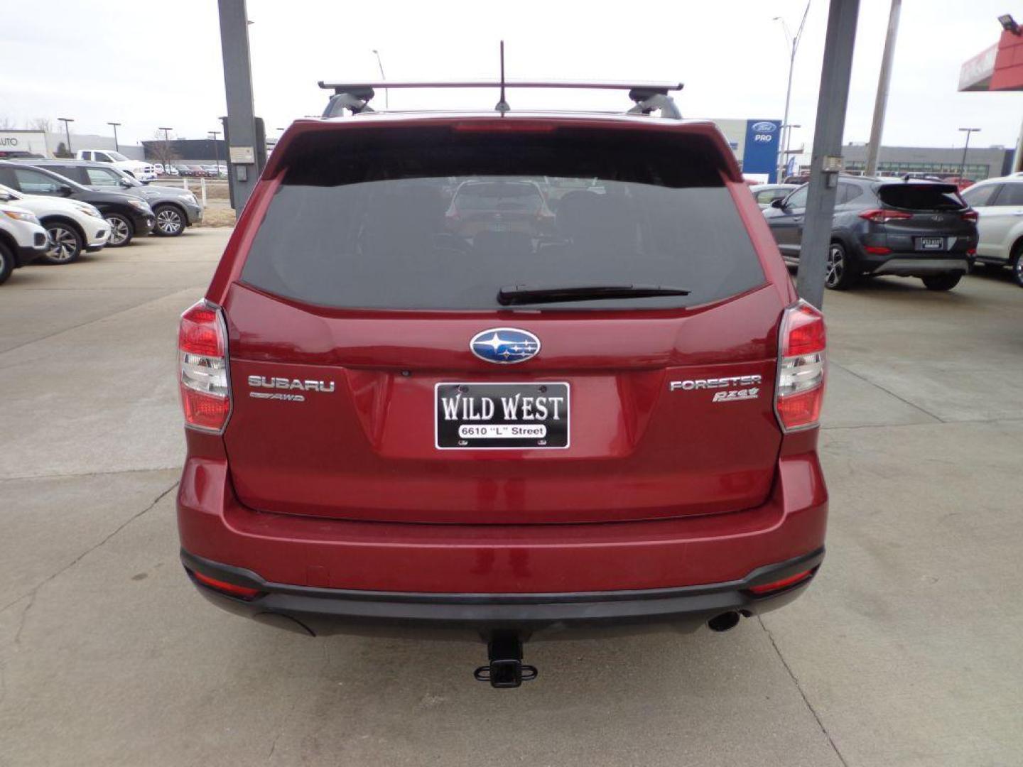 2014 RED SUBARU FORESTER 2.5I LIMITED (JF2SJAHC1EH) with an 2.5L engine, Continuously Variable transmission, located at 6610 L St., Omaha, NE, 68117, (402) 731-7800, 41.212872, -96.014702 - SHARP LIMITED MODEL WITH SUNROOF, BACKUP CAM, HEATED LEATHER AND NEWER TIRES! *****We have found that most customers do the majority of their shopping online before visiting a dealership. For this reason we feel it necessary to have a competitive price on our used vehicles right up front. W - Photo#4