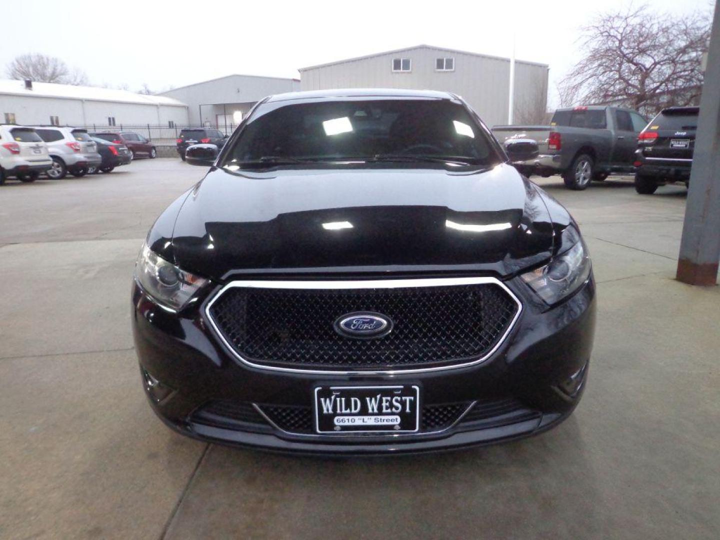 2013 BLACK FORD TAURUS SHO (1FAHP2KT0DG) with an 3.5L engine, Automatic transmission, located at 6610 L St., Omaha, NE, 68117, (402) 731-7800, 41.212872, -96.014702 - 1-OWNER, CLEAN CARFAX, RUST-FREE, AWD, LOW MILEAGE, HEATED AND COOLED SEATS AND A SUNROOF! *****We have found that most customers do the majority of their shopping online before visiting a dealership. For this reason we feel it necessary to have a competitive price on our used vehicles righ - Photo#1