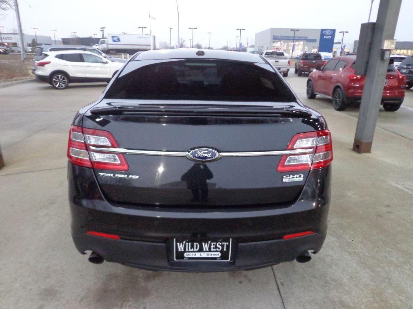 2013 BLACK FORD TAURUS SHO (1FAHP2KT0DG) with an 3.5L engine, Automatic transmission, located at 6610 L St., Omaha, NE, 68117, (402) 731-7800, 41.212872, -96.014702 - 1-OWNER, CLEAN CARFAX, RUST-FREE, AWD, LOW MILEAGE, HEATED AND COOLED SEATS AND A SUNROOF! *****We have found that most customers do the majority of their shopping online before visiting a dealership. For this reason we feel it necessary to have a competitive price on our used vehicles righ - Photo#4