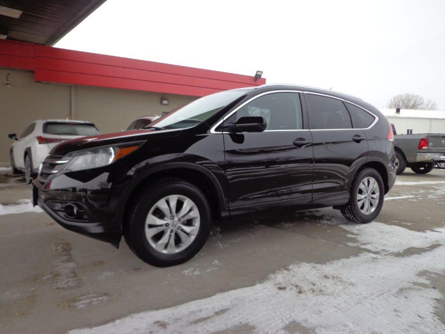 2013 BLACK HONDA CR-V EXL (2HKRM4H75DH) with an 2.4L engine, Automatic transmission, located at 6610 L St., Omaha, NE, 68117, (402) 731-7800, 41.212872, -96.014702 - SHARP 1-OWNER, CLEAN CARFAX, AWD, LOW MILEAGE, HEATED LEATHER, SUNROOF, NAV, BACKUP CAM AND NEWER TIRES! *****We have found that most customers do the majority of their shopping online before visiting a dealership. For this reason we feel it necessary to have a competitive price on our used v - Photo#0