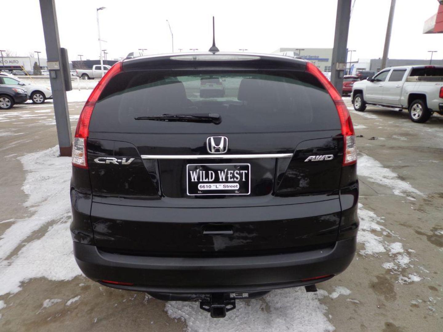 2013 BLACK HONDA CR-V EXL (2HKRM4H75DH) with an 2.4L engine, Automatic transmission, located at 6610 L St., Omaha, NE, 68117, (402) 731-7800, 41.212872, -96.014702 - SHARP 1-OWNER, CLEAN CARFAX, AWD, LOW MILEAGE, HEATED LEATHER, SUNROOF, NAV, BACKUP CAM AND NEWER TIRES! *****We have found that most customers do the majority of their shopping online before visiting a dealership. For this reason we feel it necessary to have a competitive price on our used v - Photo#4