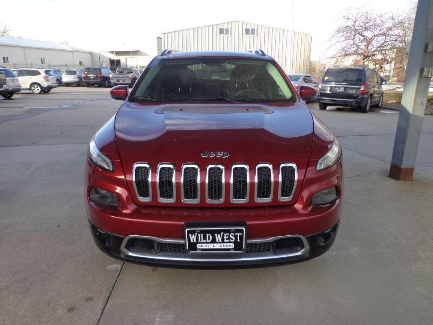 2015 RED JEEP CHEROKEE LIMITED (1C4PJMDB9FW) with an 2.4L engine, Automatic transmission, located at 6610 L St., Omaha, NE, 68117, (402) 731-7800, 41.212872, -96.014702 - Photo#1